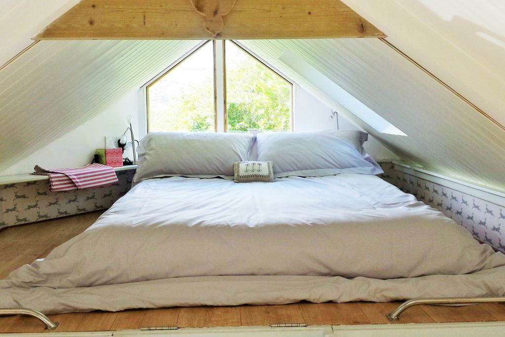 The cosy mezzanine level bedroom