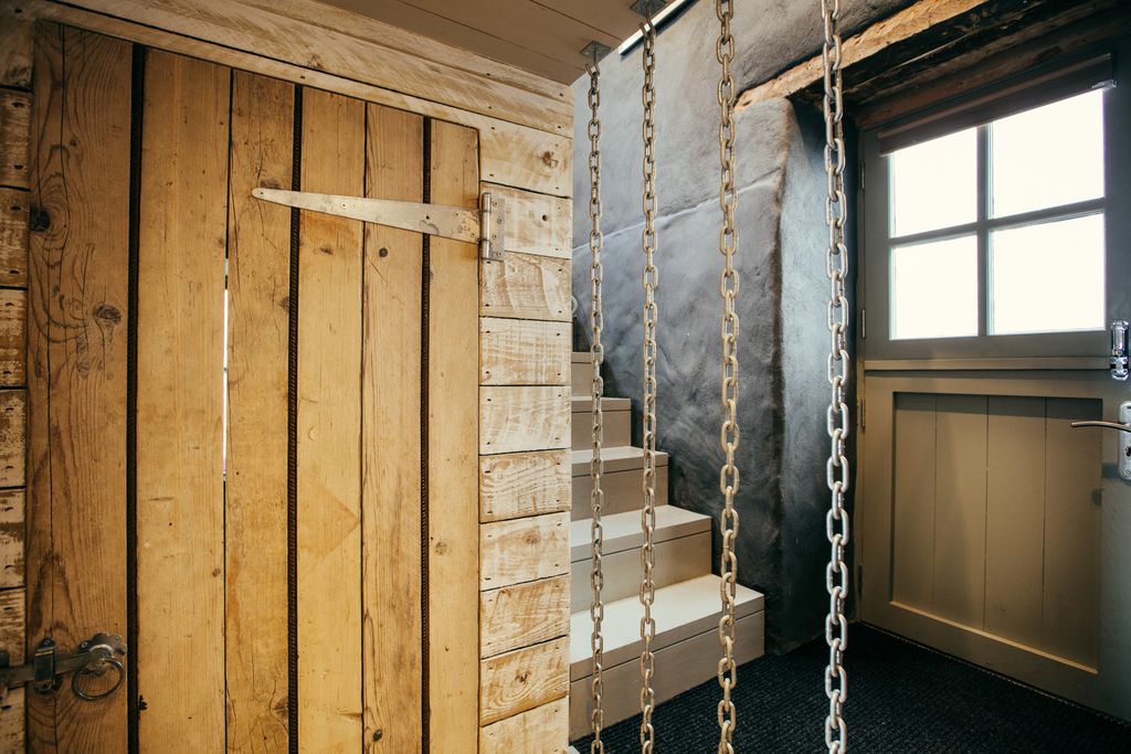 Bottom of the stairs and side entrance to Harbour Moon