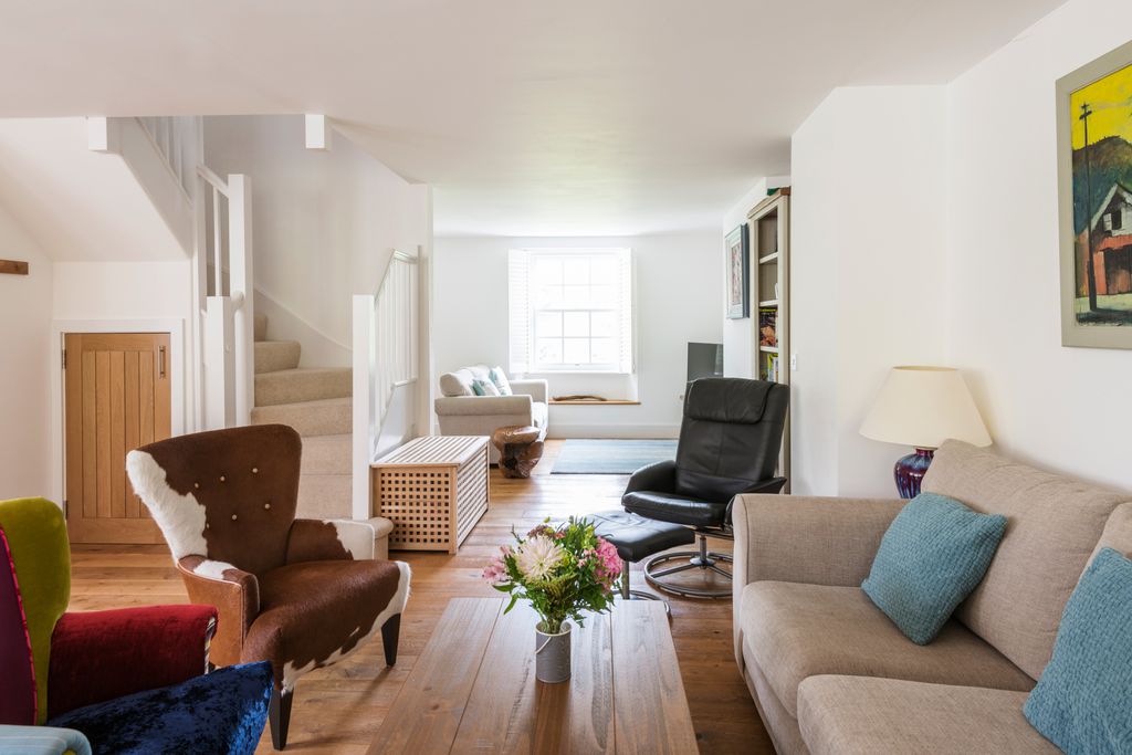Living area with sofas and artistic chairs