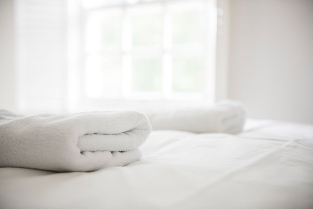 Close up of towels on a bed