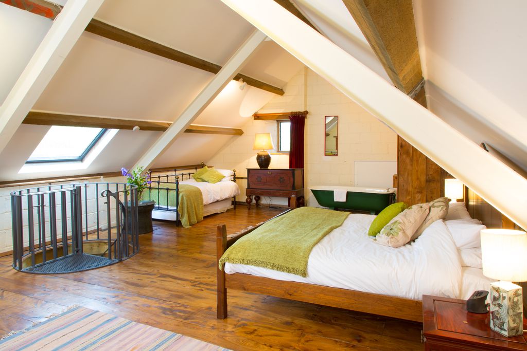 Family room with a double bed and two single beds