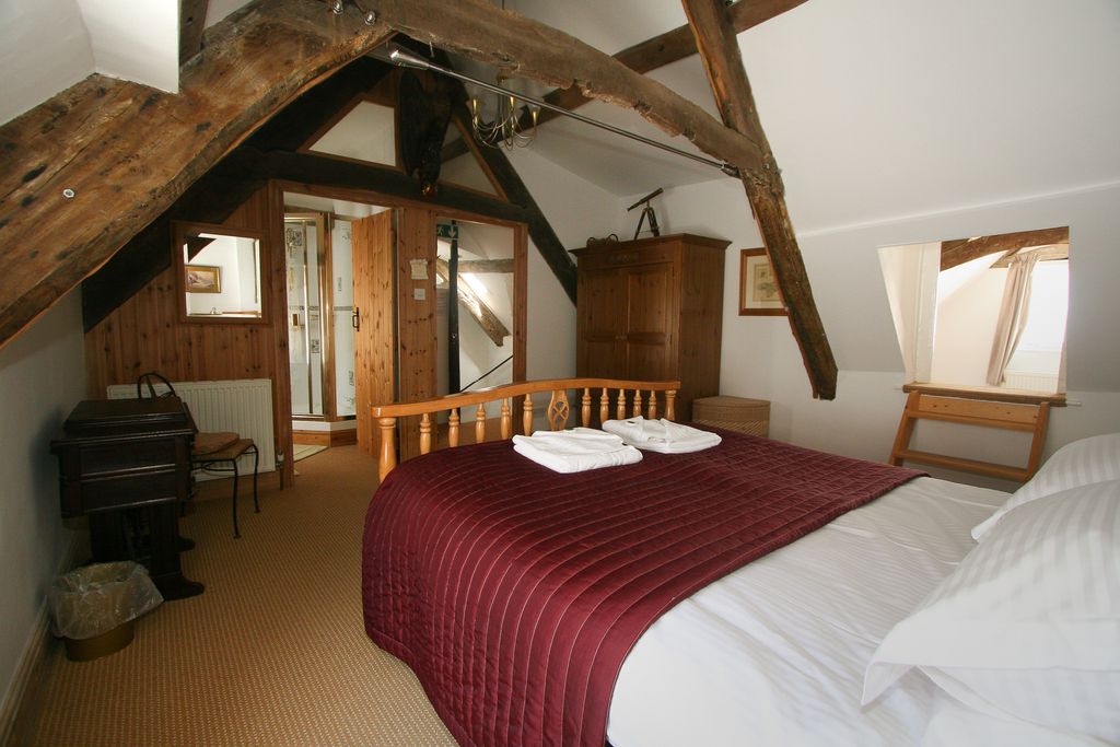 Double bedroom on top floor with en suite and shower