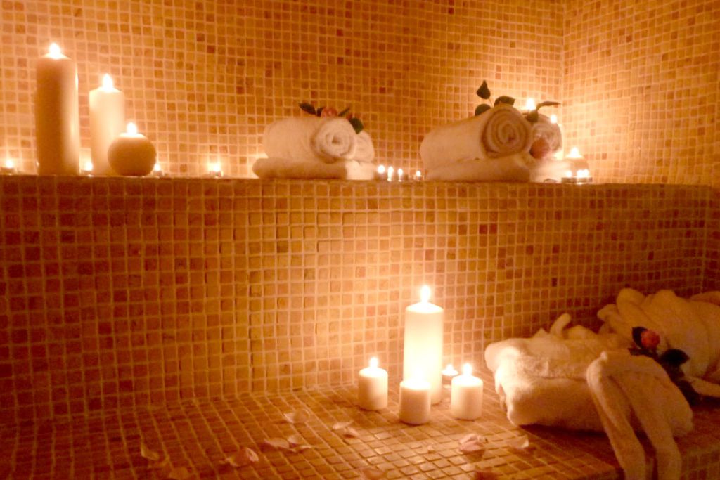 Candles lit with towels at Domaine de Moulin Mer