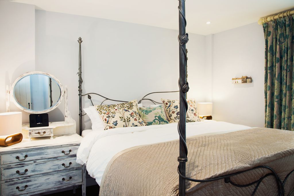 Cosy bedroom with a double bed and chest of drawers