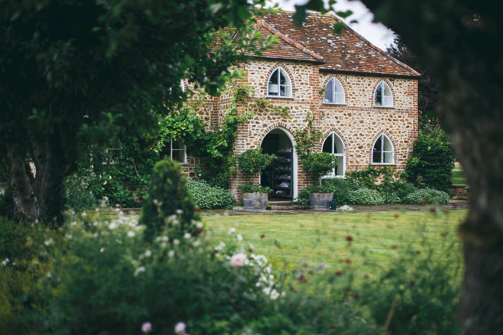 The main house at Long Acre Farm near Lambourn, Swindon, surrounded by meadows and fields for a true country retreat.