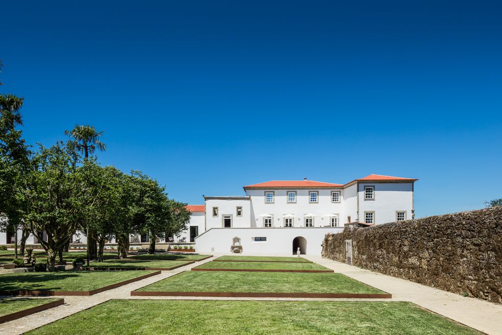 Exterior of Paco de Vitorino in Ponte de Lima in Portgual and the surrounding grounds on a lovely sunny day