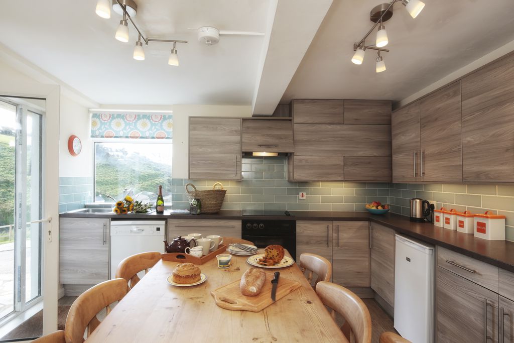 Modern kitchen with freshly baked cakes on the table