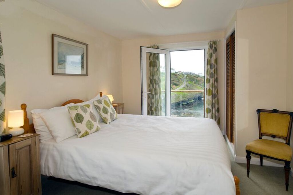 Double bedroom with door leading onto the balcony