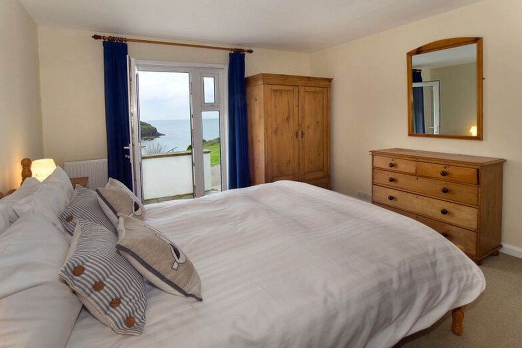Double bedroom with door leading onto the garden