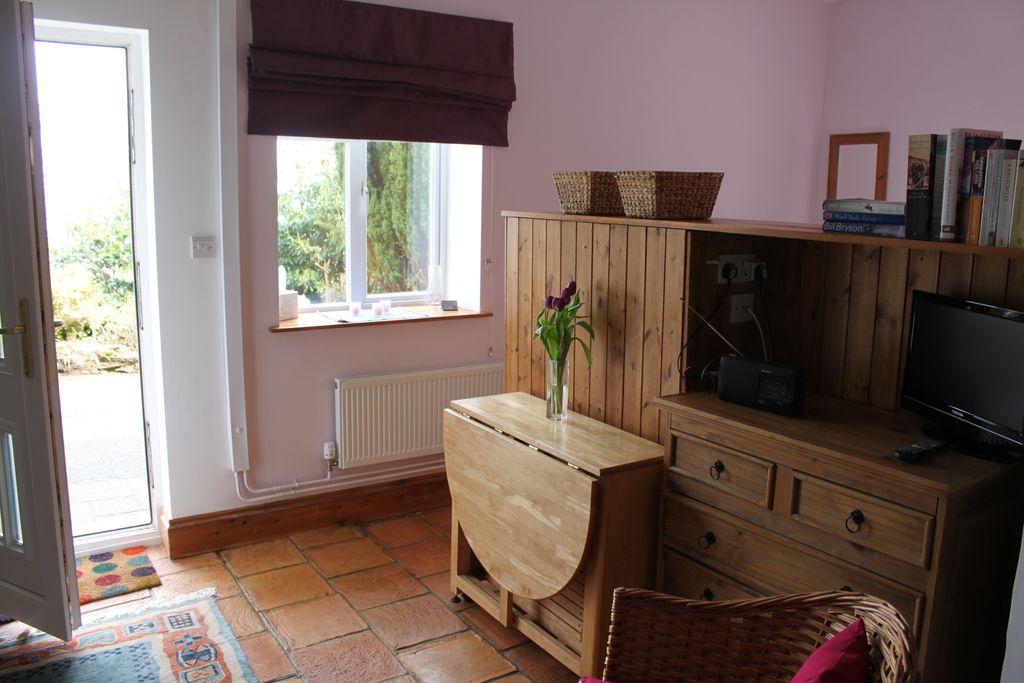 Dining table and door out onto the driveway