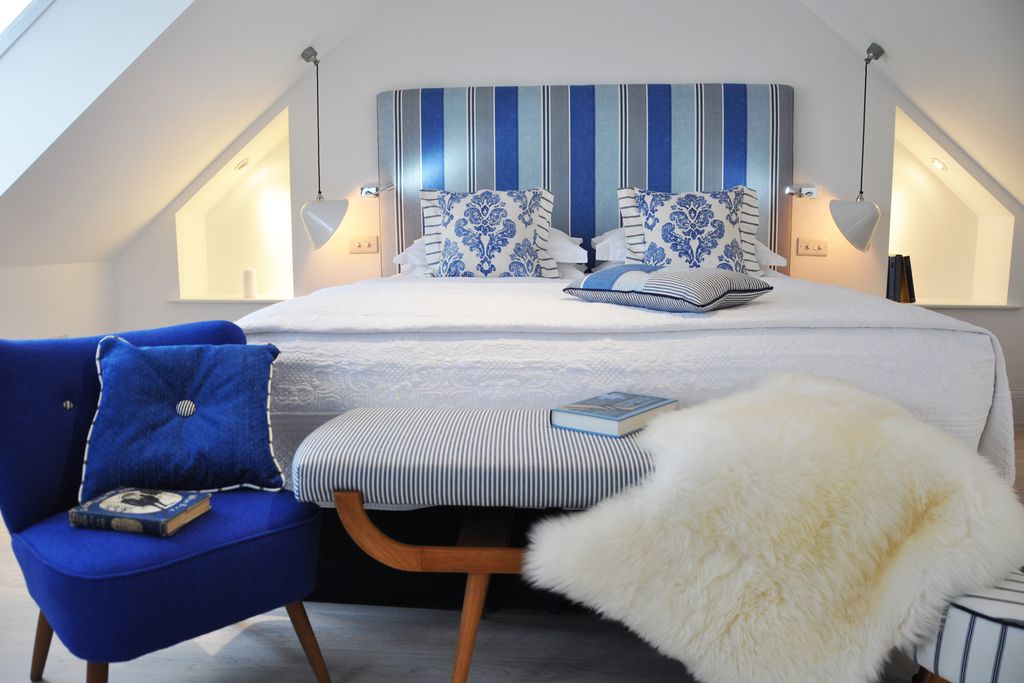 Stylish double bedroom at the Trevose Harbour House in Cornwall