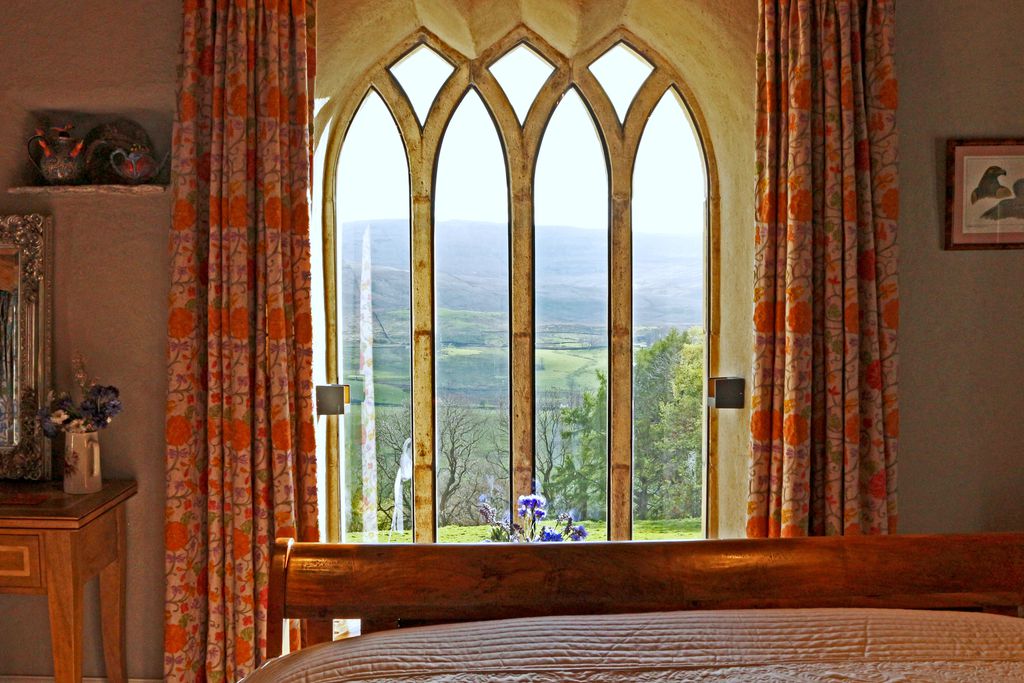 View through the window to the surrounding countryside from one of the lovely bedrooms at Windy Hall in Alston, Cumbria