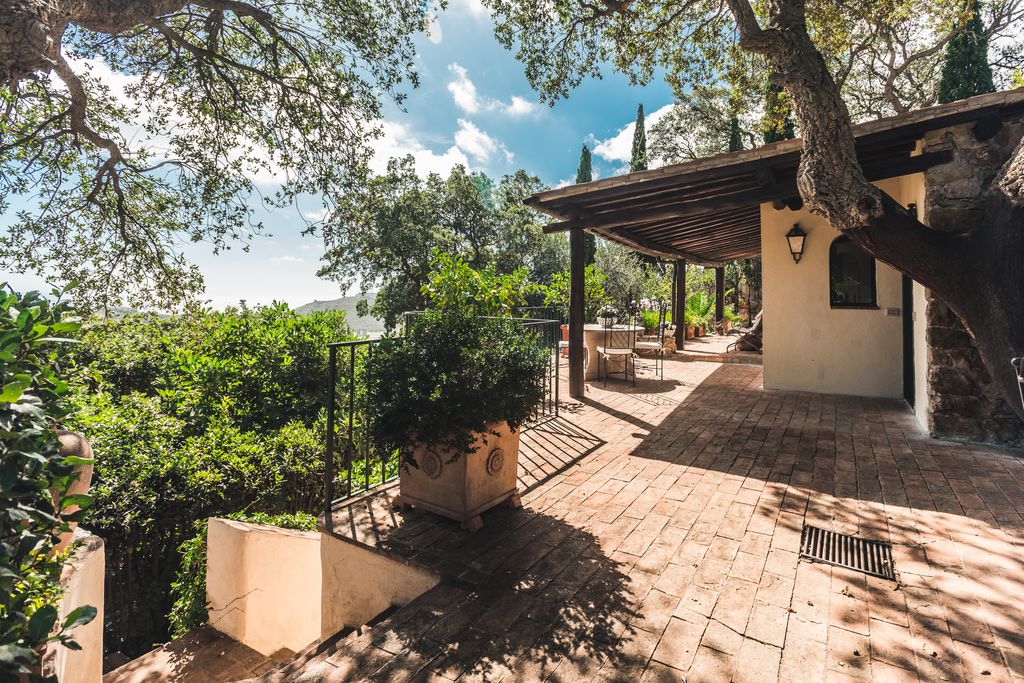 Outdoor terrace at La Marchesa in Porto Ercole, Italy - a gorgeous and rustic stone house up in the hills