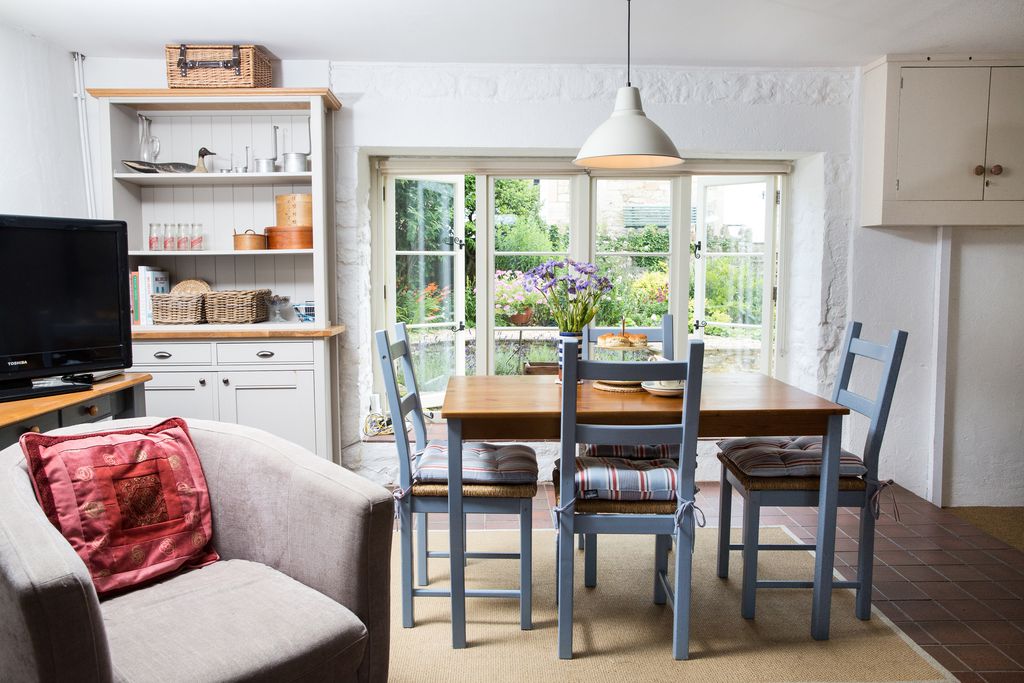 Cost kitchen and dining area inside of Old Dairy Barn in Bath, England 