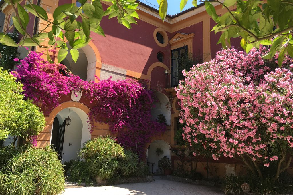1973 Neopolitan villa Relais Castelcicala, covered in gorgeous flowers in the tranquil grounds near Naples