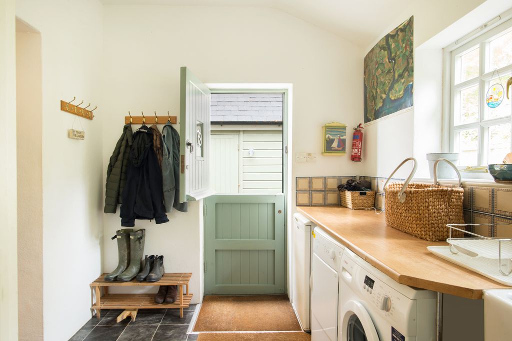 Coats and wellies hung up and ready for a walk in the beautiful surrounding countryside