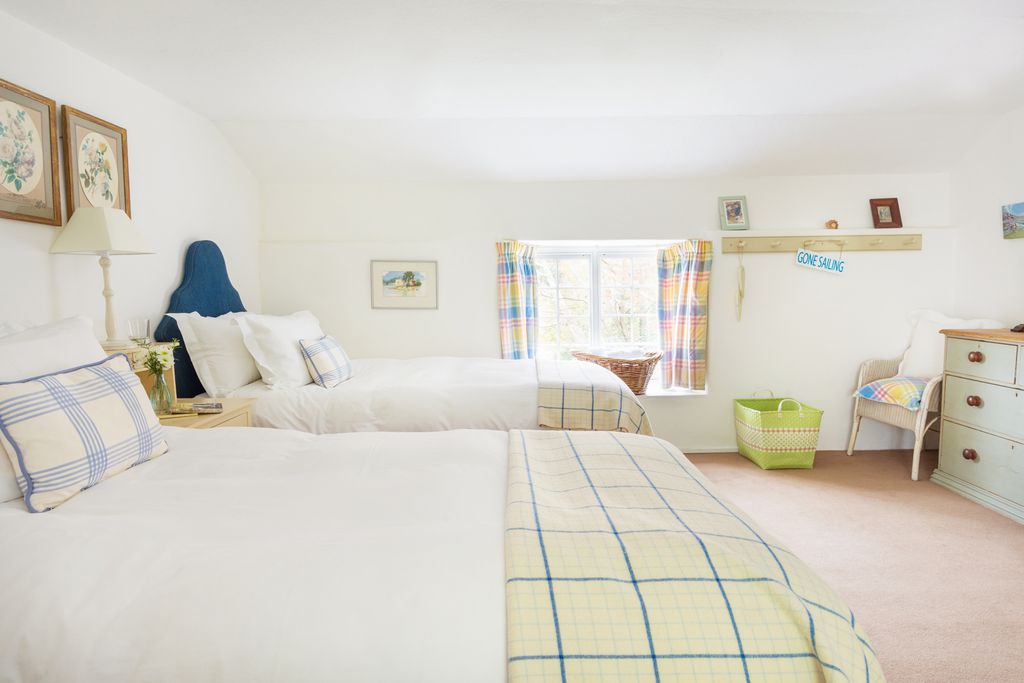 Matching twin beds in second bedroom at Penpoll