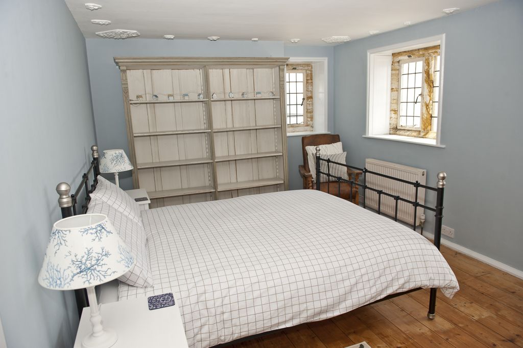 Double bed with tree style lampshades at The Sundial