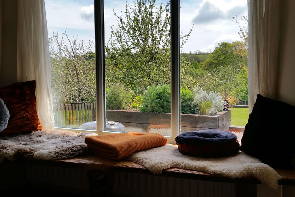 Cosy window seat looking out into the garden