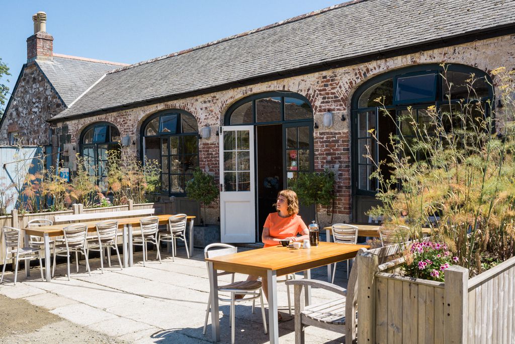 Enjoying a cup of coffee on the outside seating area