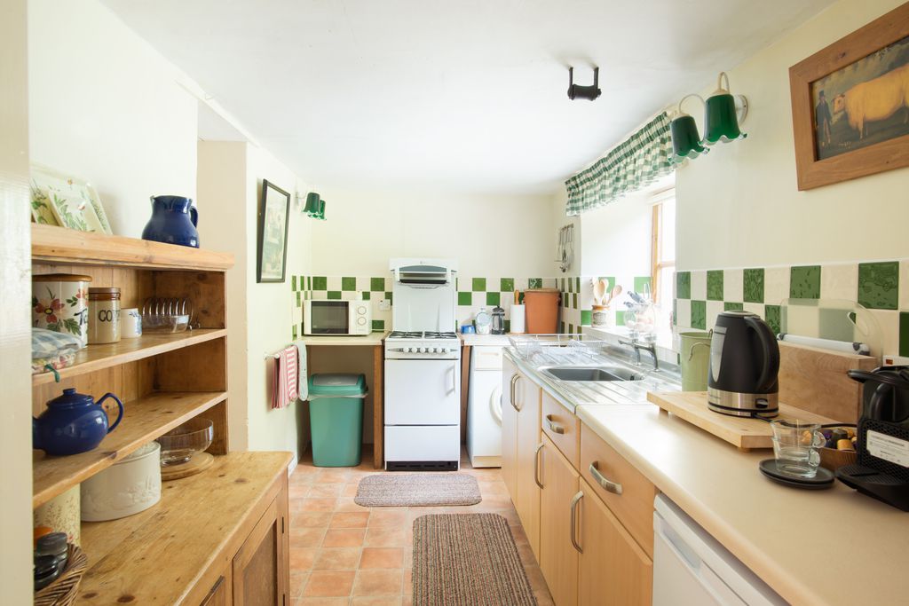 Galley kitchen with modern appliances