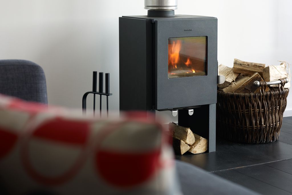 Modern log burner in the sitting room at An Airigh in Scotland 