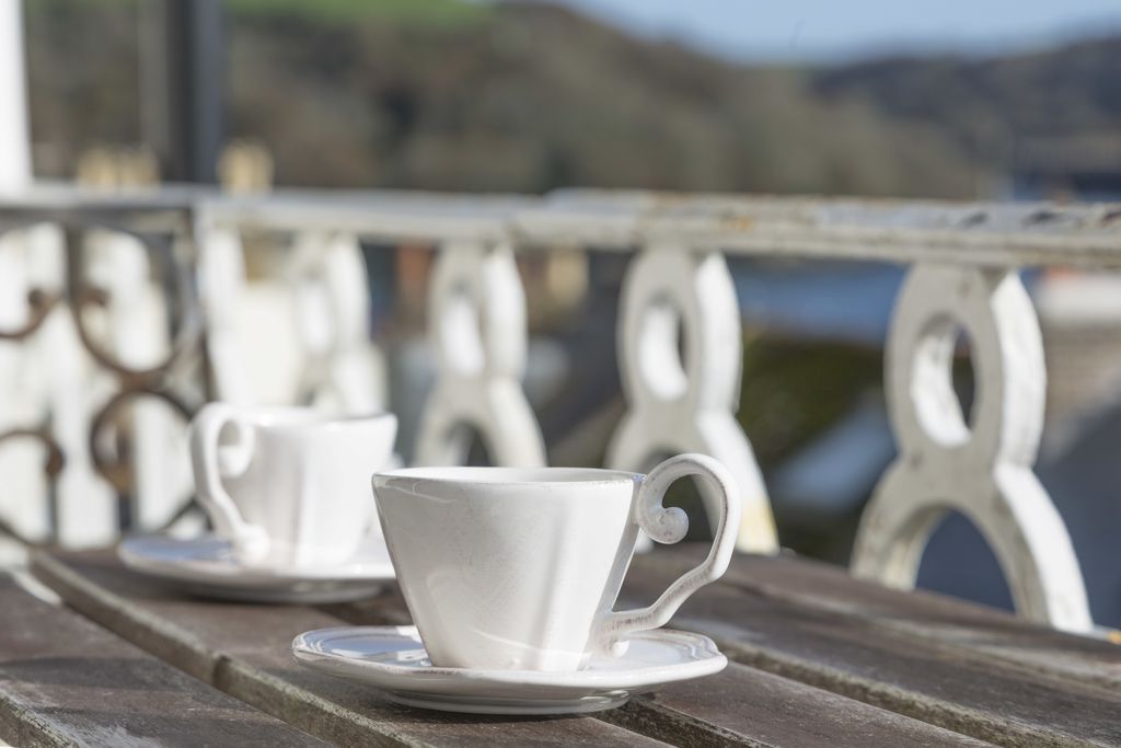 Cups of tea on the balcony