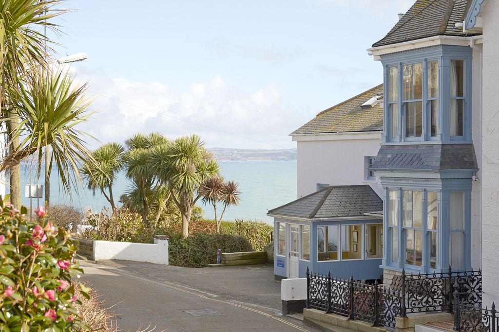 The Old Coastguard exterior during the sunset view onto the sea in Penzance, Cornwall, England, Britain