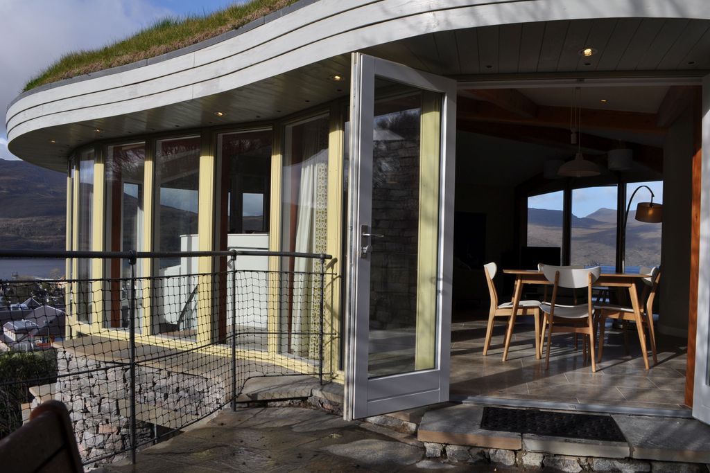 Doors leading from the living room onto the terrace