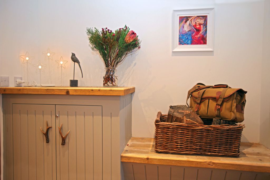 Lethnot Scotland sideboard with flowers and decorative light