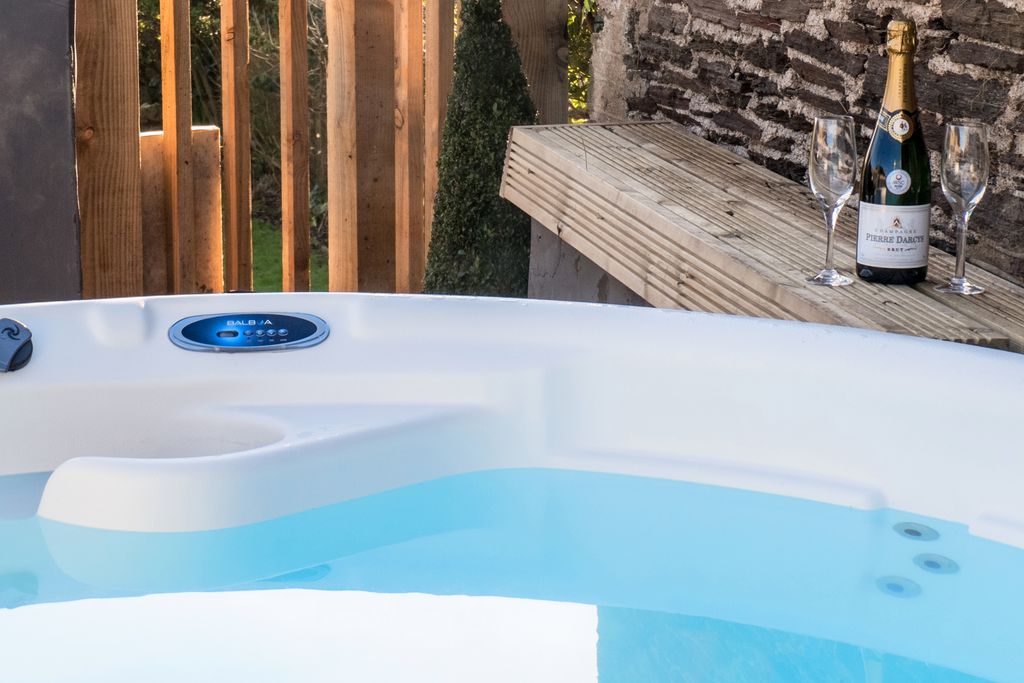 Hot tub in the gardens of the property