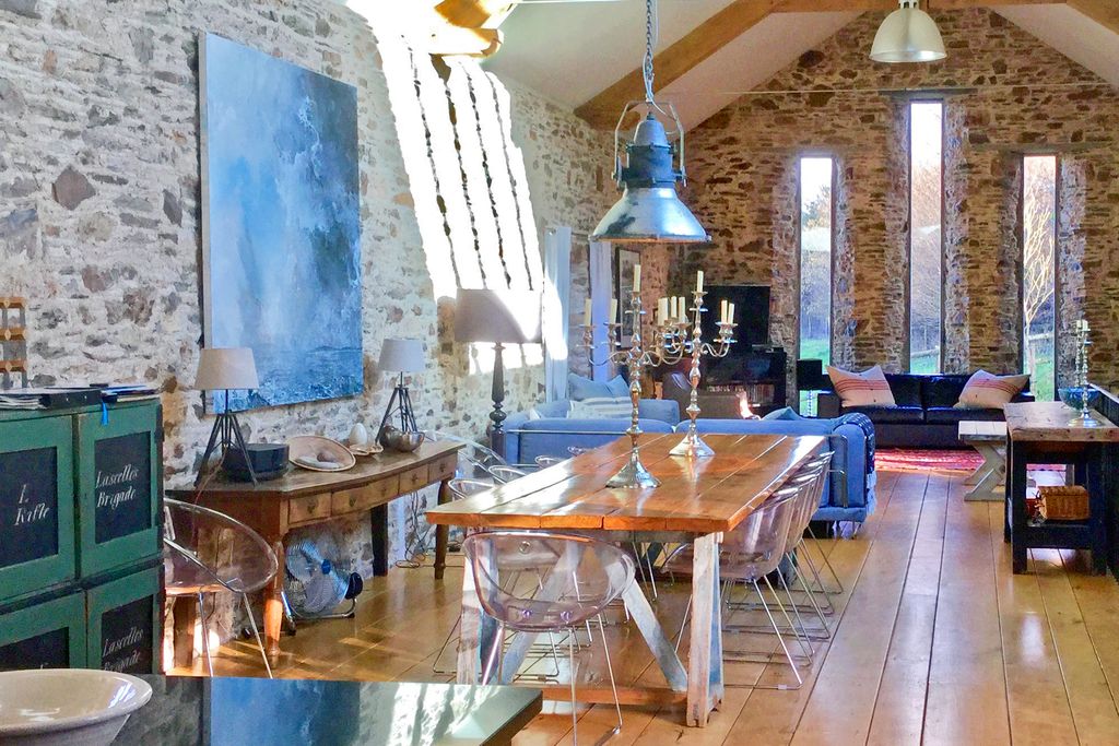 Stylish dining area followed by living room 