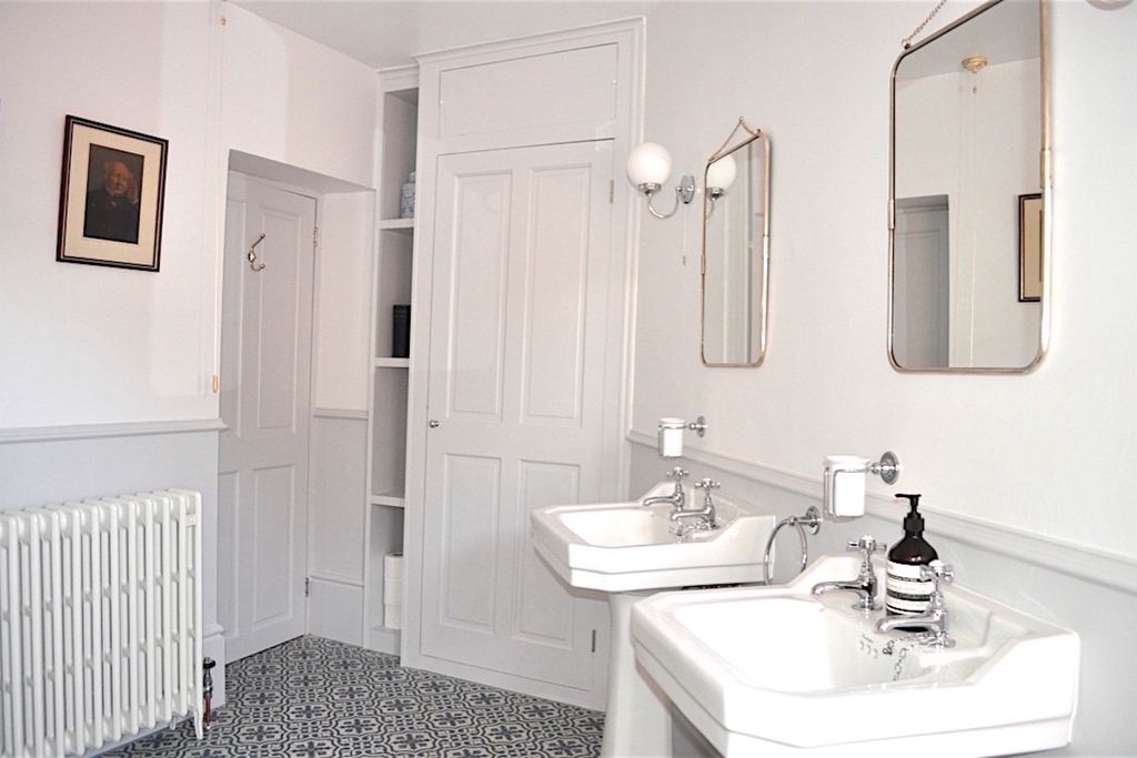 Stylish bathroom with His and Her sinks