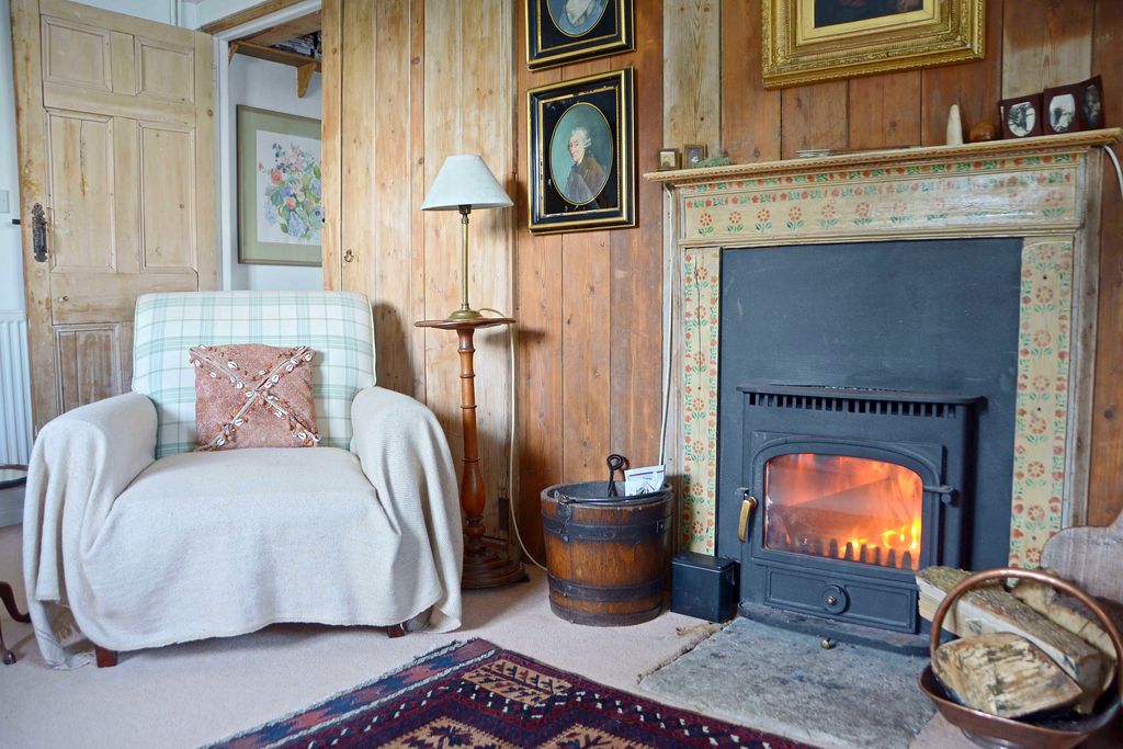 Armchair beside the wood burner