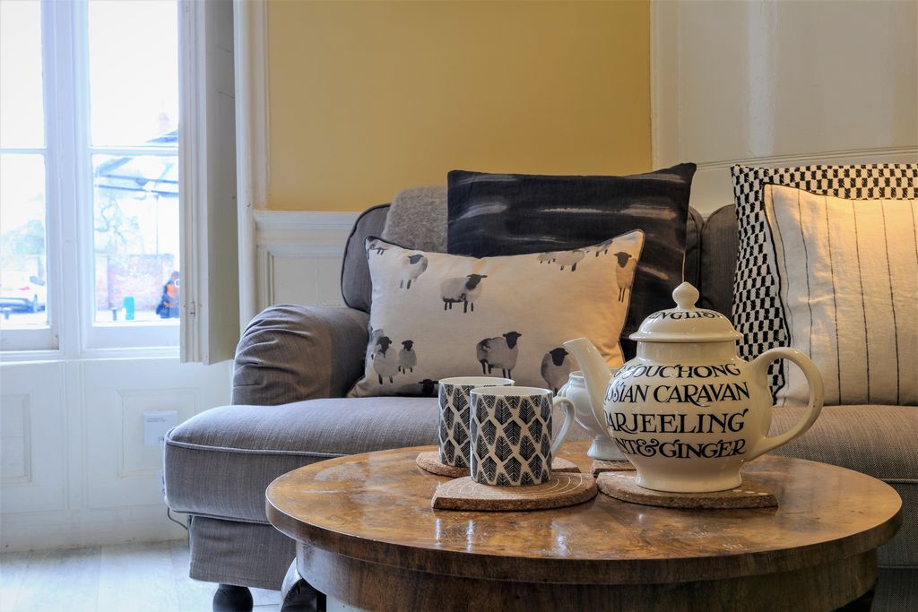 Close up of pot of tea on the table in the cosy living area at The Courtyard Studio in Monmouth, Monmouthshire