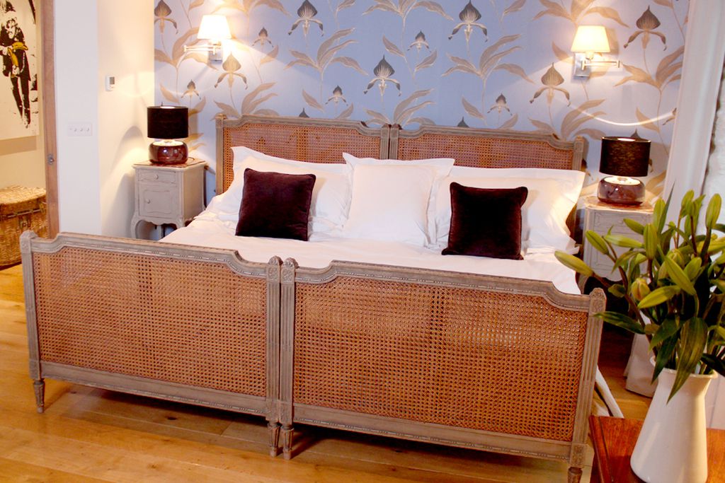 Bright and stylish bedroom with a double bed