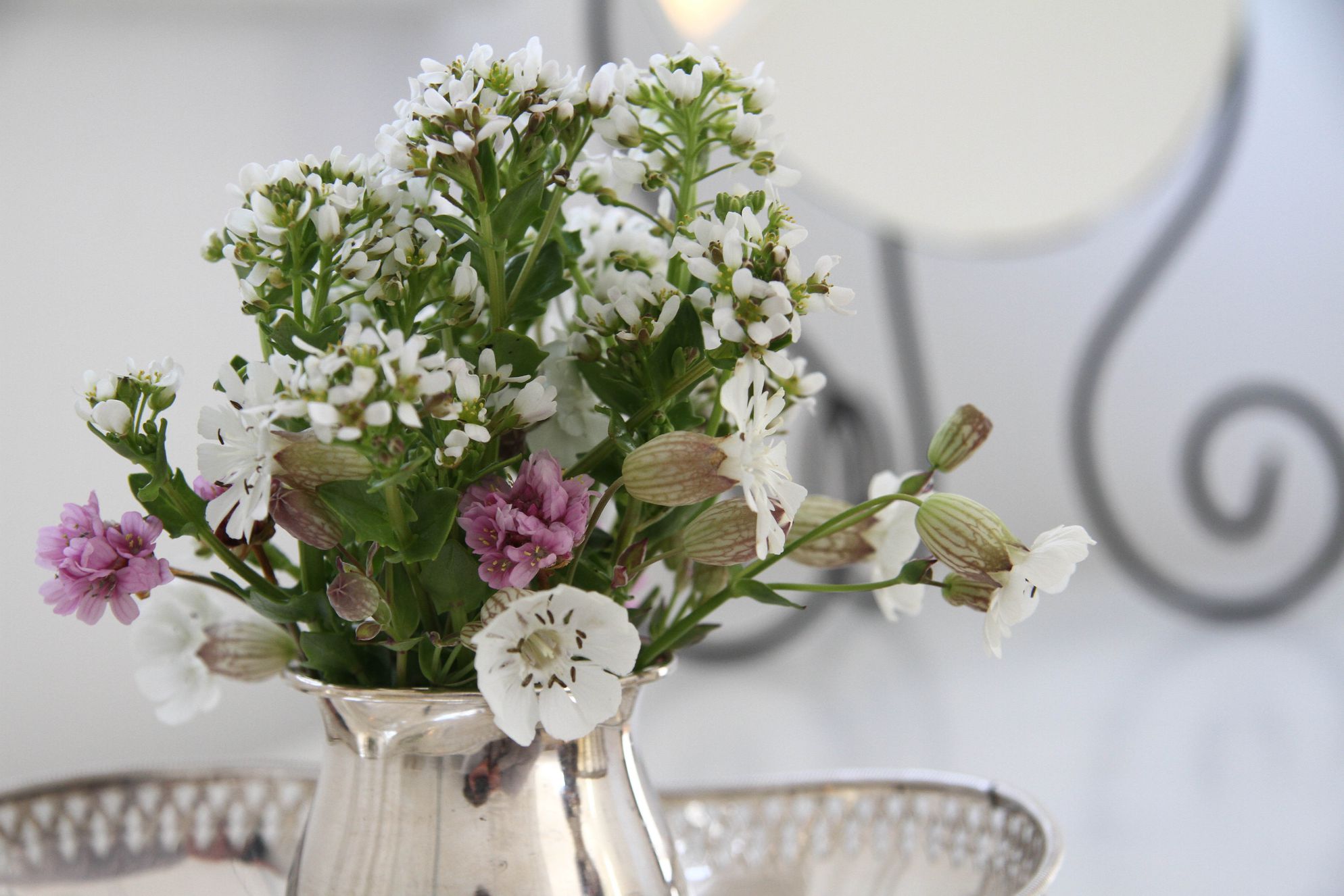 Fresh flowers sitting on the dressing table