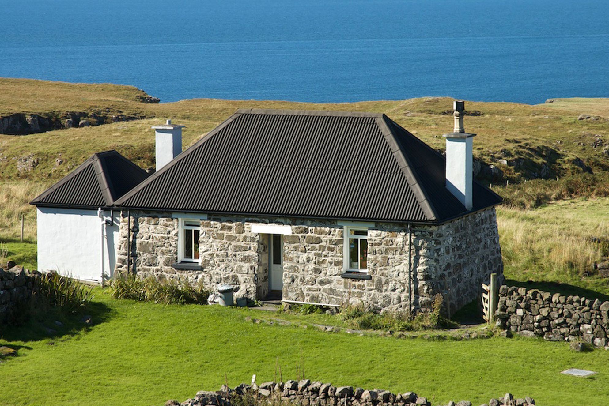 Exterior of Treshnish Farm in Scotland overlooking the sea