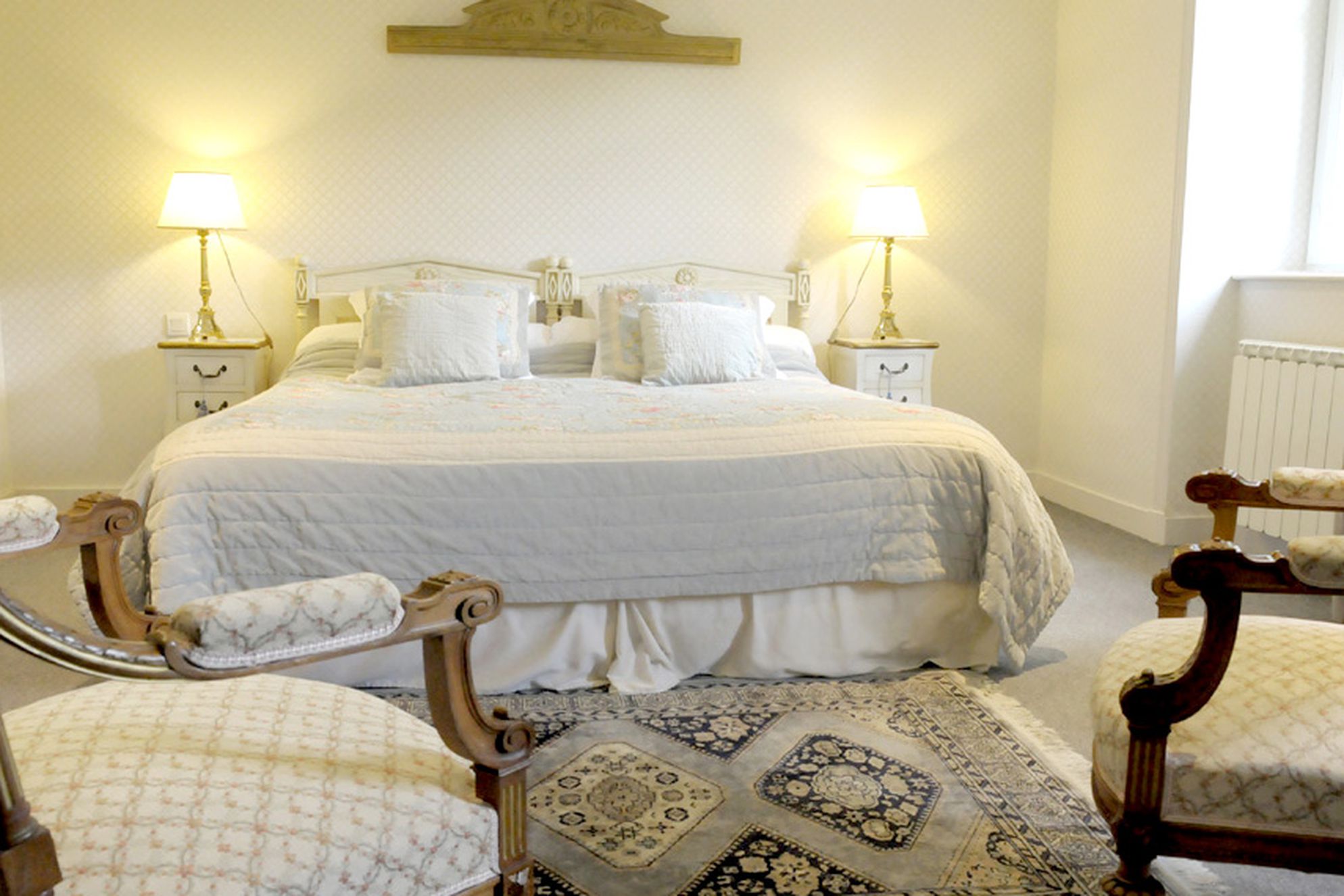 Double bedroom with bedside tables and lamps