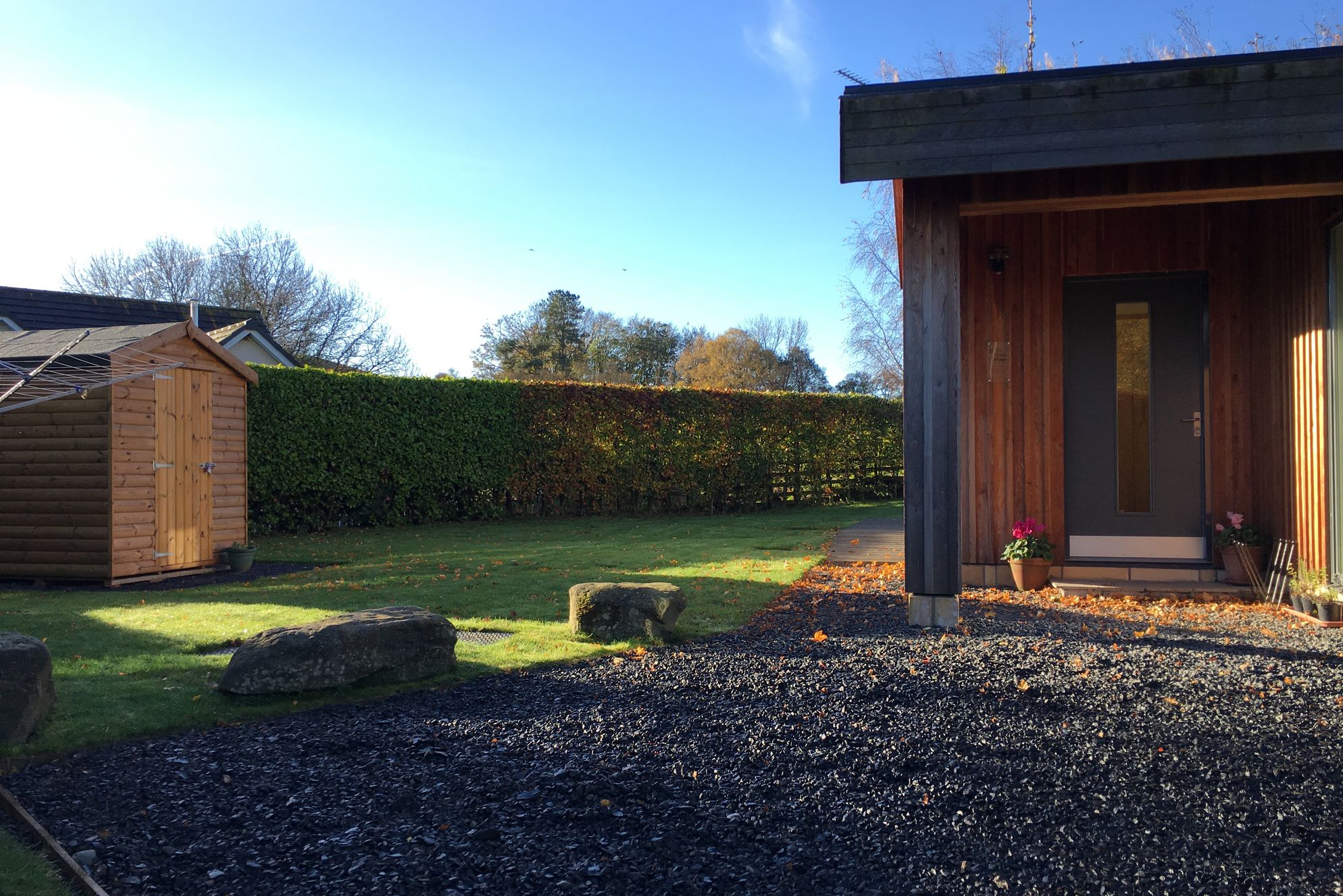 The Green House entrance to the modern timber property