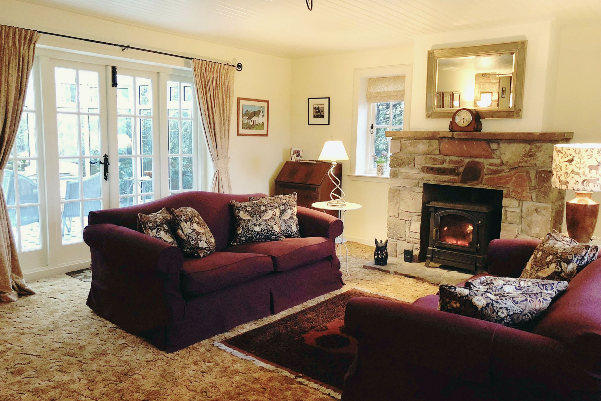 Cosy and warm living area at The Lint Mill in Lanarkshire with wood burner