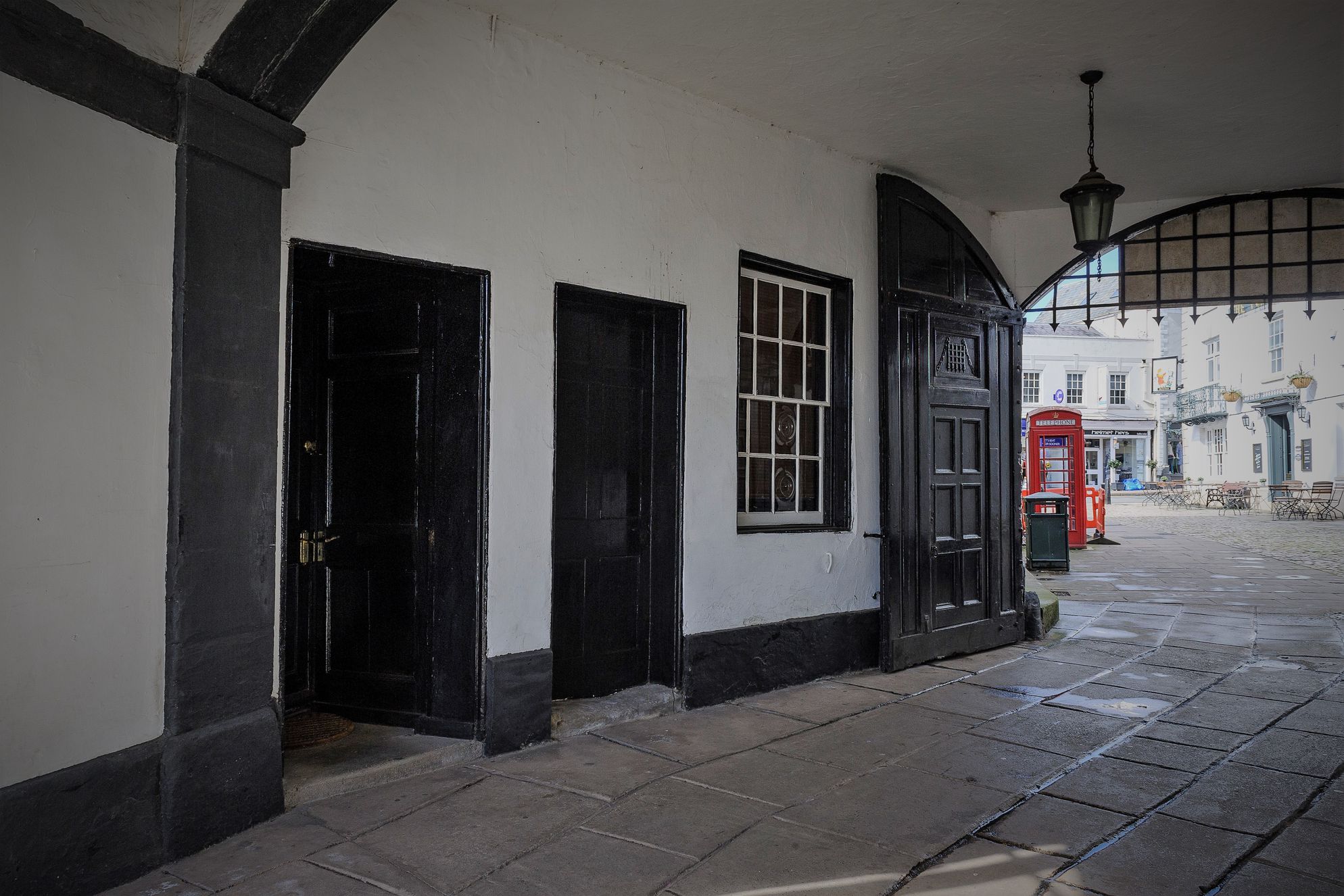Entrance to The Courtyard Studio in Monmouth, Monmouthshire, under an old archway right in the heart of town