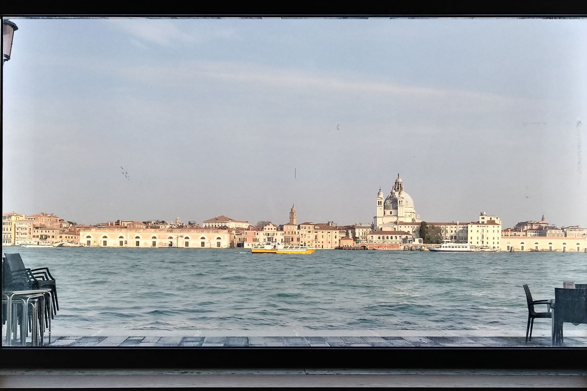 Huge picture window overlooking the Giudecca Canal inside Zitelle 81