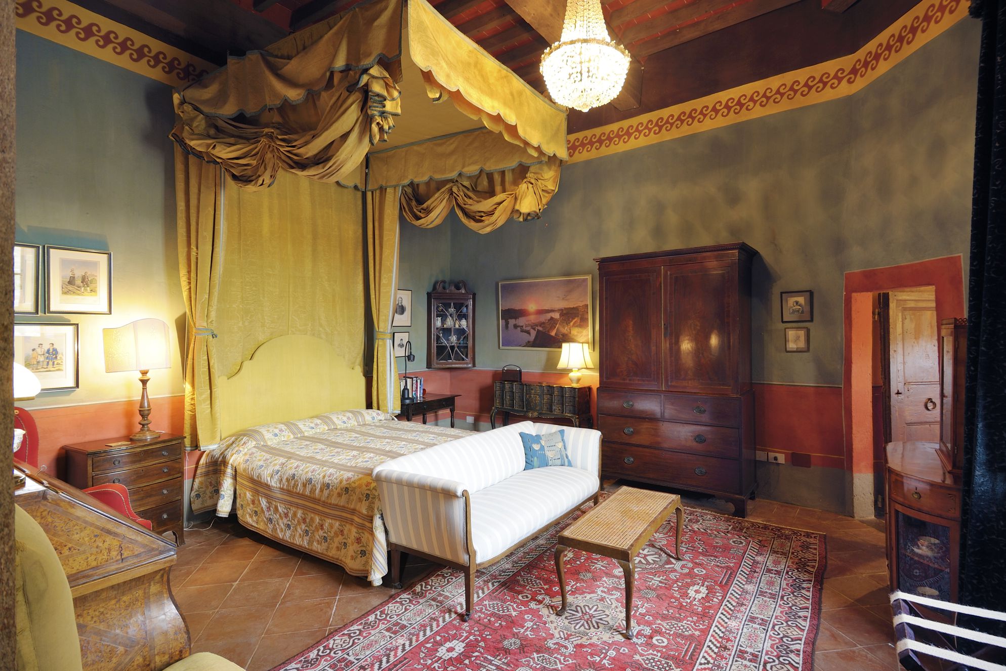 Big, beautiful bedroom oozing with character inside of Castello di Potentino