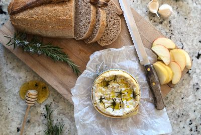 Homemade bread and baked Camembert