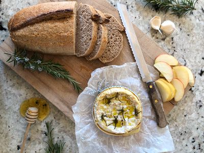 Homemade bread and baked camembert