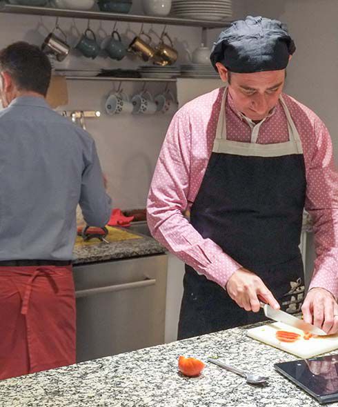 Sawday's owners Dave and Javier preparing supper